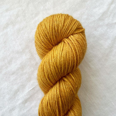 Shangdrok Turmeric Merino DK hand-dyed pure merino