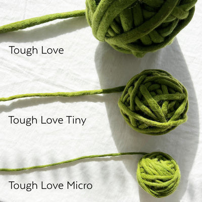 Three green yarn balls labeled 'Tough Love', 'Tough Love Tiny', and 'Tough Love Micro' on a white background.