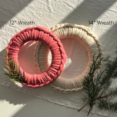 Two wool wreaths on a white background