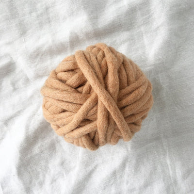Love Fest Fibers Tough Love Tiny felted chunky wool yarn. Hand-felted from pure New Zealand wool by women artisans in Nepal. Great for knitting, crochet, weaving and macrame projects.