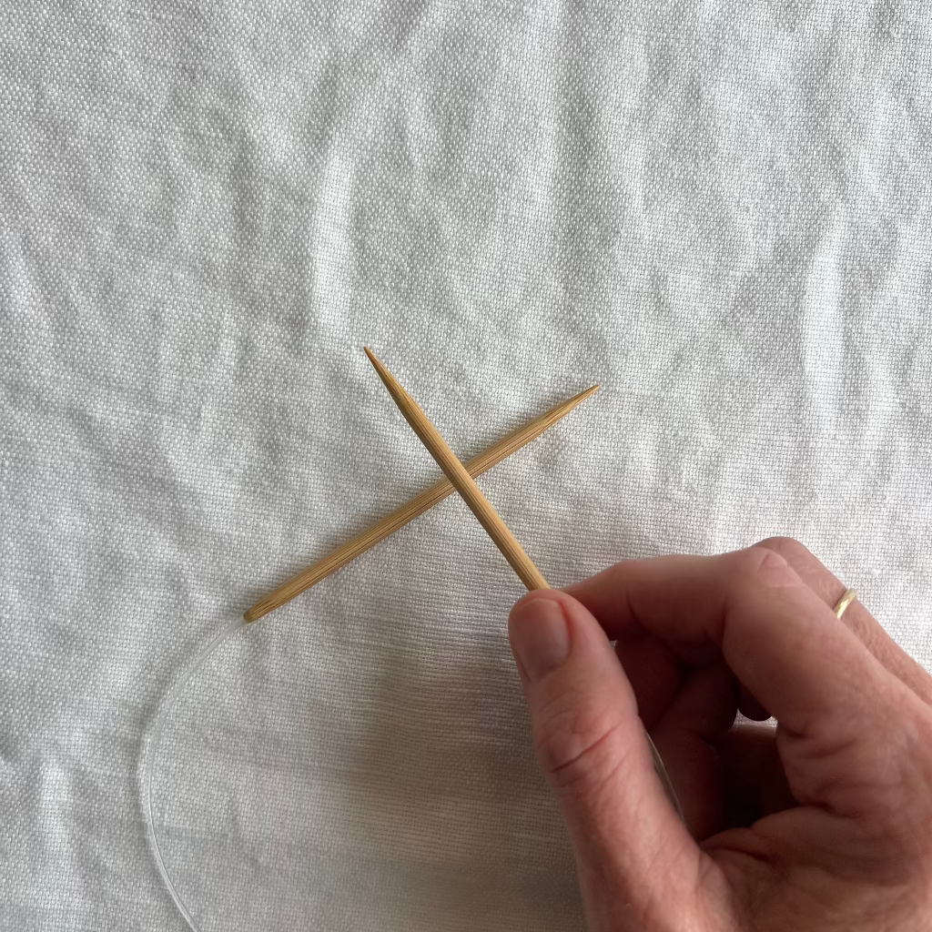 Circular knitting needles on white background, cord length 16, needle length 3.5.