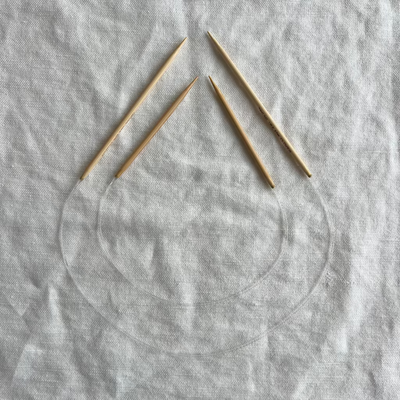 Two sets of circular knitting needles from Love Fest Fibers.