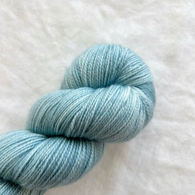 Shangdrok hand-dyed merino fingering weight knitting and crochet yarn