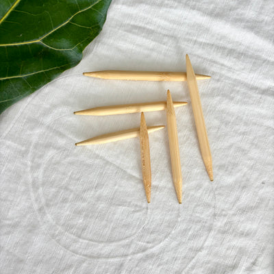 circular knitting needles in size 15, varying lengths
