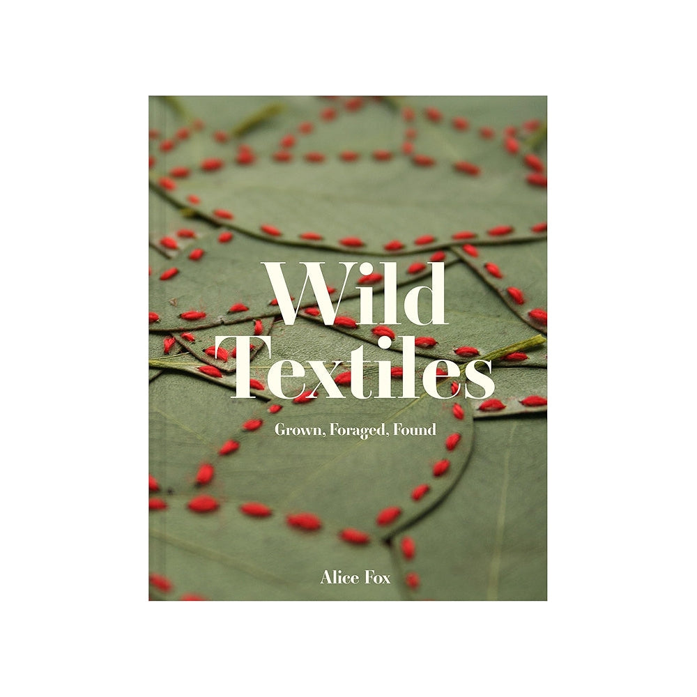 Book cover of 'Wild Textiles' with a green background and red text.