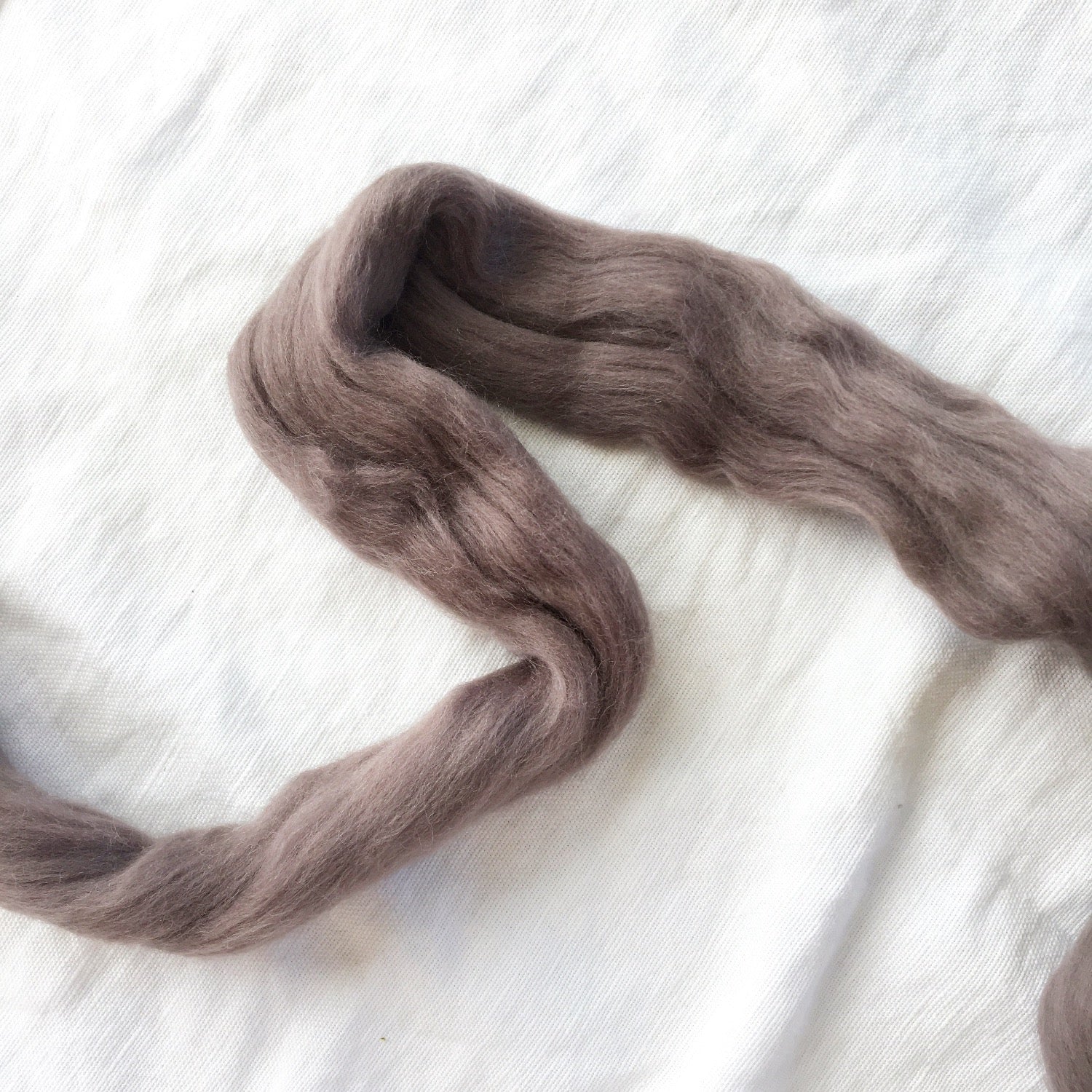 Meghan Shimek & Love Fest Fibers roving for weaving, knitting, crocheting, felting. Sustainable merino & Targhee fiber giant yarn.