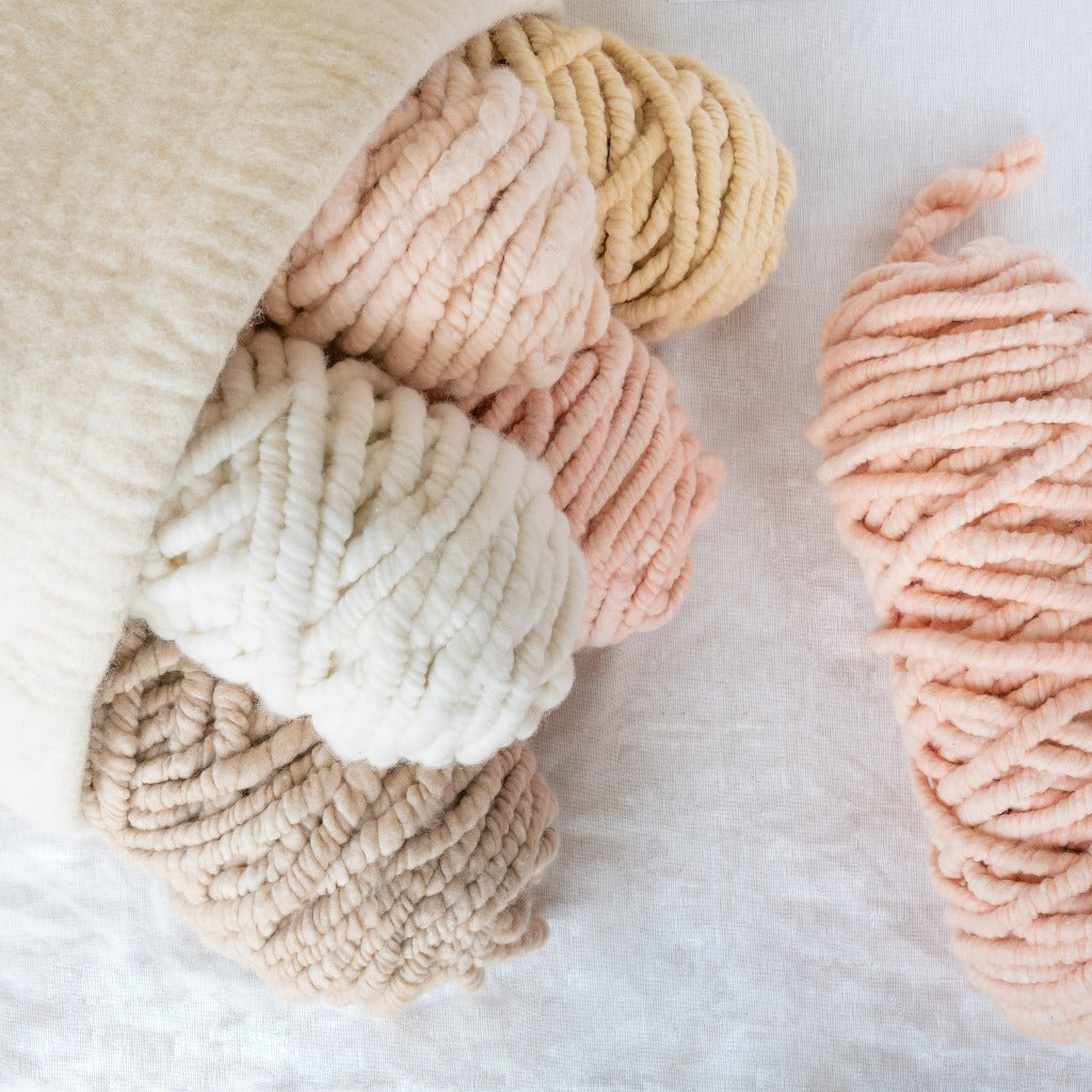 Love Fest Fibers Cloudline super chunky yarn. Core-spun using just pure merino wool and American organic cotton. All natural fibers that are ideal for weaving, knitting and crochet projects.